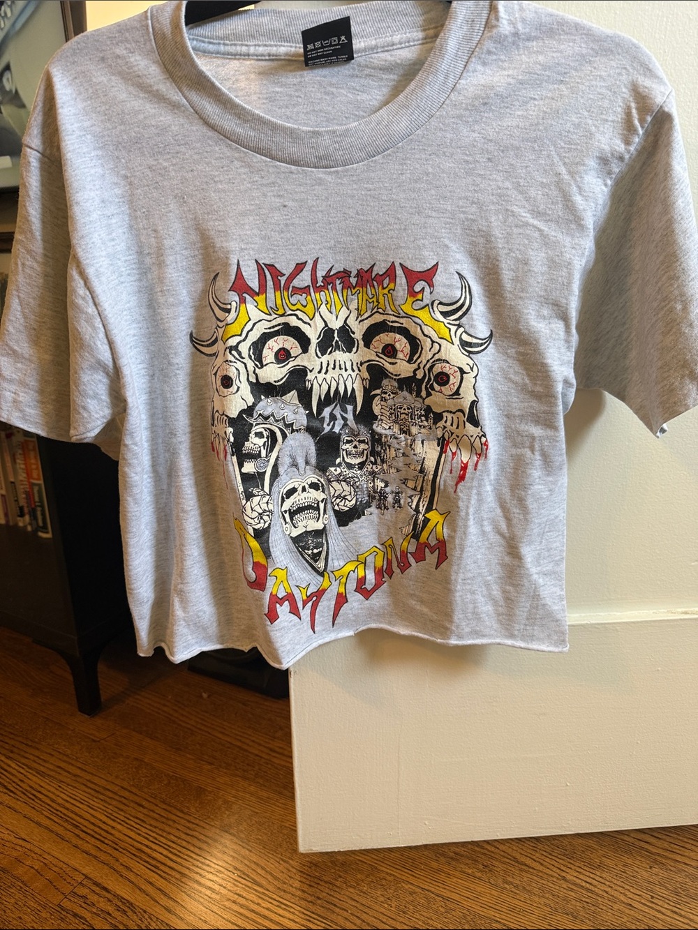Vintage Grey Crop Top with Red & Yellow 'Nightmare' Skull Graphic